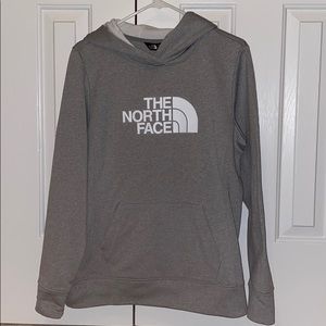 woman’s North Face sweatshirt
